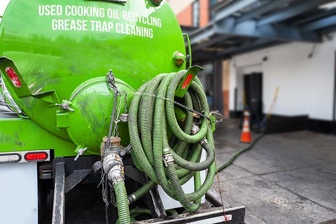 routine pumping of grease trap at a cafeteria in Arcadia, CA